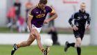 Wexford defender Brian Malone on the move. Photograph: Inpho