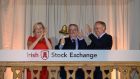 AIB chief executive Bernard Byrne rings the bell at the Irish Stock Exchange with Deirdre Somers, Irish Stock Exchange chief executive and AIB chairman Richard Pym as formal trading commenced in the bank’s shares following last week’s IPO. Photograph: Dara Mac Donaill / The Irish Times