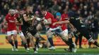 Iain Henderson of the Lions charges into Brad Shields and Mark Abbott of the Hurricanes. Photograph: David Rogers/Getty Images
