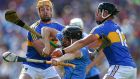 Tipperary’s Padraic Maher and Dan McCormack crowd out  Donal Burke of Dublin. Photograph: Cathal Noonan/Inpho