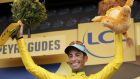 Astana Pro Team rider Fabio Aru celebrates on the podium wearing the overall leader’s yellow jersey following the 12th stage of the 104th edition of the Tour de France. Photo: Yoan Valat/EPA