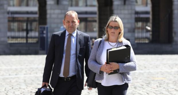 Sgt Maurice McCabe with his wife, Lorraine, at the Charleton tribunal in Dublin Castle, on Monday.  Photograph: Collins Photos