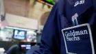 A trader works at the Goldman Sachs stall on the floor of the New York Stock Exchange. Photograph: Reuters