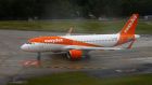 An EasyJet aircraft is ready for take off at Cointrin airport in Geneva, Switzerland. Photograph: Reuters