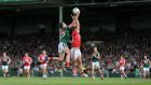 Cork’s Sean Powter in  action with  Jason Doherty of Mayo during All-Ireland Senior Football Championship Qualifiers Round 4A at the  Gaelic Grounds, Limerick. Photograph: Cathal Noonan/Inpho