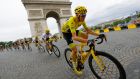 Chris Froome passes the Arc de Triomphe on the final stage  on his way to overall victory in the Tour de France. Photograph:  Robert Ghement/EPA
