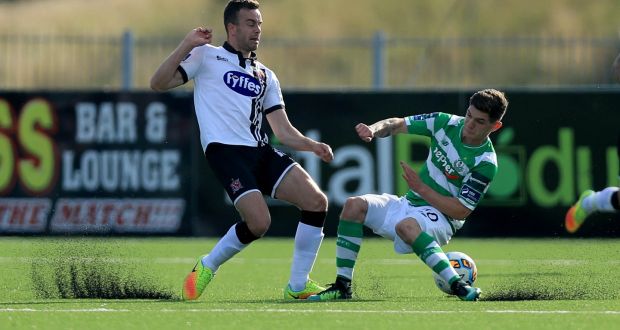 Dundalk’s Robbie Benson competes for the ball with Trevor Clarke of Shamrock Rovers during the SSE Airtricity League Premier Division match at Oriel Park. Photograph: Donall Farmer/Inpho