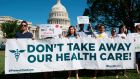 Healthcare protest: a rally outside the US Capitol, in Washington, DC. Photograph: Saul Loeb/AFP/Getty