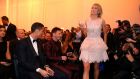  Lionel Messi and Cristiano Ronaldo look on as Stephanie Roche arrives for the 2014 Fifa Ballon d’Or Gala. Photograph:  Alexander Hassenstein/Getty Images