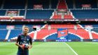 Neymar poses with a ball during his official presentation at the Parc des Princes. Photo: Philippe Lopez/Getty Images