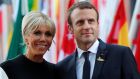   Brigitte  and Emmanuel Macron: Ms Macron is waiting for her situation to be clarified, as her husband promised during his presidential campaign. Photograph: Wolfgang Rattay/Reuters