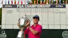 Justin Thomas with the Wanamaker Trophy. Photograph: Stuart Franklin/Getty
