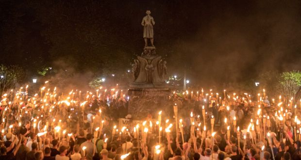 Torch-bearing white nationalists rally around a statue of Thomas Jefferson near the University of Virginia campus in Charlottesville on August 11th. Photograph: Edu Bayer/The New York Times