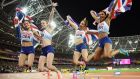 Britain’s women’s 4x400m relay team of  Zoey Clark, Laviai Nielsen, Eilidh Doyle and Emily Diamond  celebrate winning silver at the World Championships in London.  Photograph: Matthias Hangst/Getty Images.
