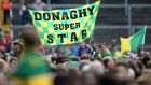  Kerry fans with a flag supporting Kieran Donaghy in 2014. Photograph: Cathal Noonan/Inpho