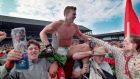 Mayo’s Colm McMenamon celebrates with fans after beating Kerry in the 1996 All-Ireland SFC semi-final. Photograph: Inpho