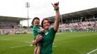 Ireland’s Lindsay Peat waves to the crowd with her son Barra after the defeat to Wales in the  Women’s Rugby World Cup seventh-place playoff at  Kingspan Stadium on Saturday. Photograph: Dan Sheridan/Inpho