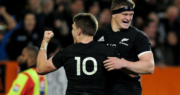  New Zealand’s Beauden Barrett celebrates his late try with his brother Scott. Photograph: Joe Allison/Inpho