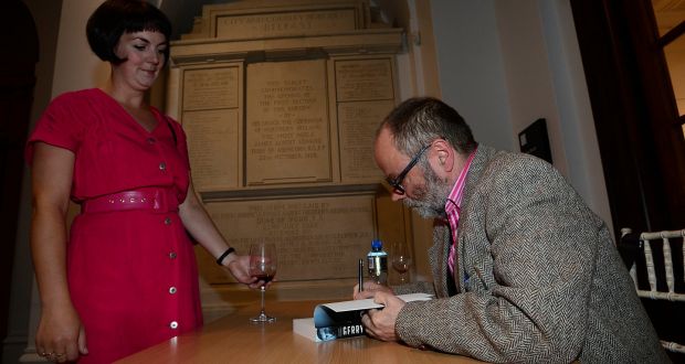 Malachi O’Doherty signing copies of his book Gerry Adams – An Unauthorised Life. Photograph: Arthur Allison/Pacemaker Press