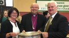 Church of Ireland Bishop of Cork Paul Colton (centre) with the Sam Maguire trophy for the All Ireland senior football championship winners. Photograph: Twitter. 