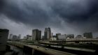 Storms clouds  over the skyline of downtown Orlando as Hurricane Irma makes its way up the Florida peninsula. Photograph: Joe Burbank/Orlando Sentinel/TNS via Getty Images