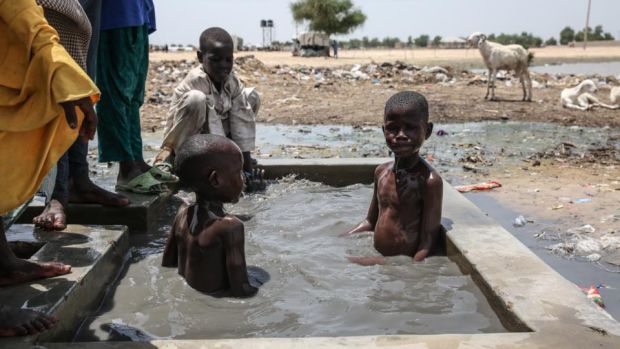 Children play in Muna Garage camp for the displaced on the outskirts of Maiduguri, northeast Nigeria. Photograph: Sally Hayden