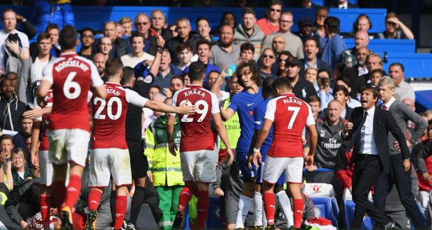  David Luiz of Chelsea is shown a red card by referee Michael Oliver at Stamford Bridge. Photograph:  Shaun Botterill/Getty Images