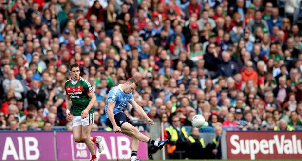 Dean Rock lands the free which won the All-Ireland for Dublin. Photograph: Ryan Byrne/Inpho