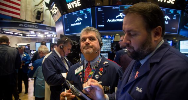 Traders on the floor of the New York Stock Exchange: Markets are pricing in a 56 per cent probability of the Fed raising rates in December.  Photograph: Michael Nagle/ Bloomberg