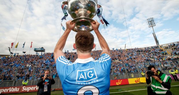 Dublin’s Brian Fenton  with the Sam Maguire. Dublin has had a massive population advantage  since the GAA was founded. To use that  to split up Dublin now is disingenuous in the extreme
