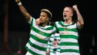 Celtic’s Scott Sinclair celebrates scoring his side’s first goal  with Leigh Griffiths during the Betfred Cup quarter-final against Dundee  at Dens Park. Photograph:  Jeff Holmes/PA Wire