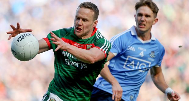  Mayo’s Andy Moran with Michael Fitzsimons of Dublin: “In terms of football this is what we do, what we love, so we just go again.” Photograph: Tommy Dickson/Inpho 