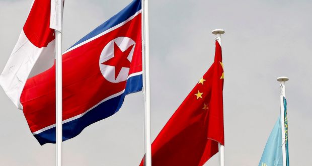 The North Korean and Chinese flags: The Korean nuclear crisis has put China in an awkward position and Beijing repeatedly emphasises its stance calling for talks. Photograph: Jeon Heon-Kyun/EPA
