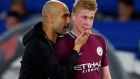  Manchester City manager Pep Guardiola with Kevin De Bruyne after their 1-0 victory over Chelsea. Photograph:  Eddie Keogh/Reuters