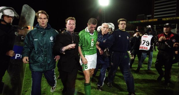 Roy Keane is escorted off the pitch after Ireland were eliminated from the Euro 2000 playoffs by Turkey amid farcical scenes in Bursa. Photo: Tom Honan/Inpho