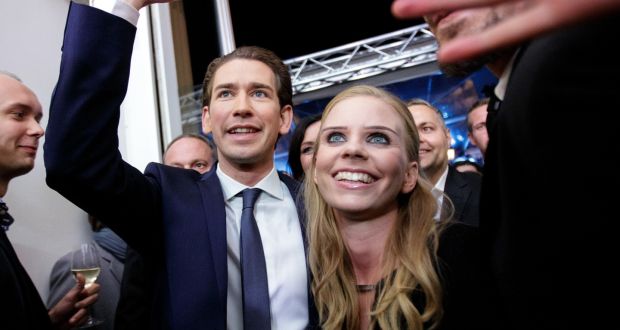 Sebastian Kurz, Austria’s foreign minister and leader of the People’s Party (OeVP), celebrates victory in Austria’s general election with his  girlfriend, Susanne Thier, in Vienna. Photograph: Lisi Niesner/Bloomberg