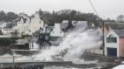 Ophelia waves crash into the town of Summercove near Kinsale, Co Cork. Photograph: John Allen