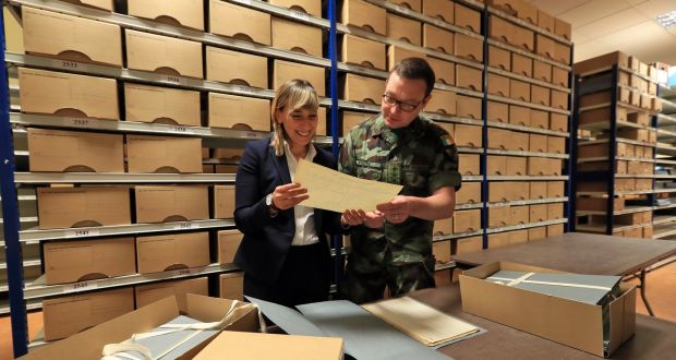 Senior archivist Cécile Gordon, project manager of the Military Service Pensions Collection, and Capt Daniel Ayiotis in the Military Archives at Cathal Brugha Barracks, Dublin. Photograph: Colin Keegan, Collins