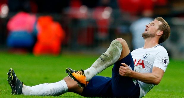 Tottenham Hotspur’s Harry Kane holds his hamstring after straining it in their win over Liverpool at Wembley. Photo: Ian Kington/Getty Images