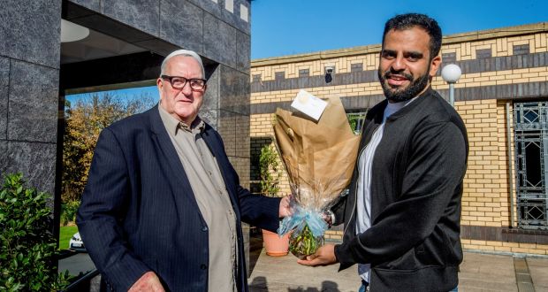 Ibrahim Halawa with Fr Seamus Fleming who made a presentation to welcome Ibrahim home after his four years in prison in Cairo.Photograph: Brenda Fitzsimons 