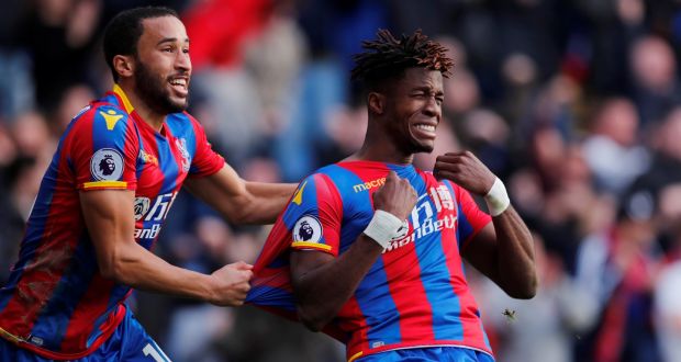 Wilfried Zaha celebrates his 97th minute equaliser for Crystal Palace. Photograph: Eddie Keogh/Reuters