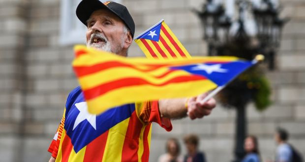 An independence supporter outside the Palau Catalan Regional Government Building in Barcelona earlier this week. Photograph: Jeff J Mitchell/Getty