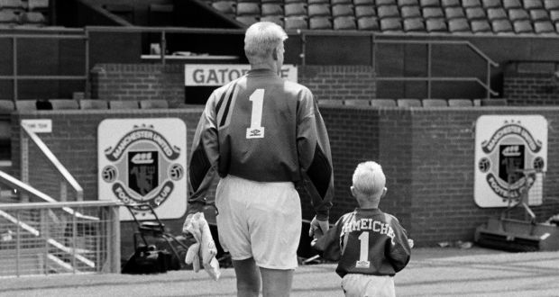 Peter Schmeichel with his son Kasper at Old Trafford in 1992. As a Manchester United fan and goalkeeper, Darren Randolph said he looked up to Schmeichel snr. Photo: Getty Images