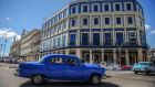 A car passes by the Telegrafo Hotel in Havana on Wednesday. Tighter restrictions on US travellers to Cuba will go into effect on Thursday, the White House  said. Photograph: Yamil Lagey/AFP/Getty Images