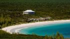 Delphi Club, Bahamas, overlooking golden sands and ocean