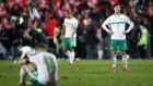 Northern Ireland’s Jordan Jones  and his team-mates look dejected after the  World Cup playoff second leg match against Switzerland  at St Jakob-Park in Basel. Photograph: Nick Potts/PA Wire