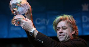 Photograph from March 2006  of Bob Geldof receiving the Freedom of Dublin City in a ceremony outside the Mansion House.  The singer and businessman has  said he will hand the award back, saying he does not want to be associated with it  while it is also held by Myanmar leader Aung San Suu Kyi. File photograph: Julien Behal/PA Wire 