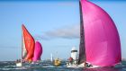 The Royal Irish J109 yacht White Mischief  (pink spinnaker in foreground), skippered by Tim and Richard Goodbody, will win the Waterhouse Shield for best boat on handicap at the DBSC awards. Photograph: David O’Brien