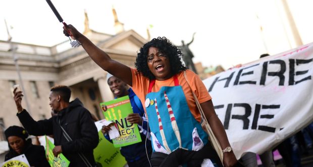 Ellie Kisyombe direct provision activist and the co-founder of Our Table at a  United Against Racism rally and march last year calling for the end to the  Direct Provision System. Photograph: Dara Mac Donaill / The Irish Times