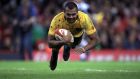 Australia’s Kurtley Beale scores a try during the Autumn International at the Principality Stadium, Photograph: PA